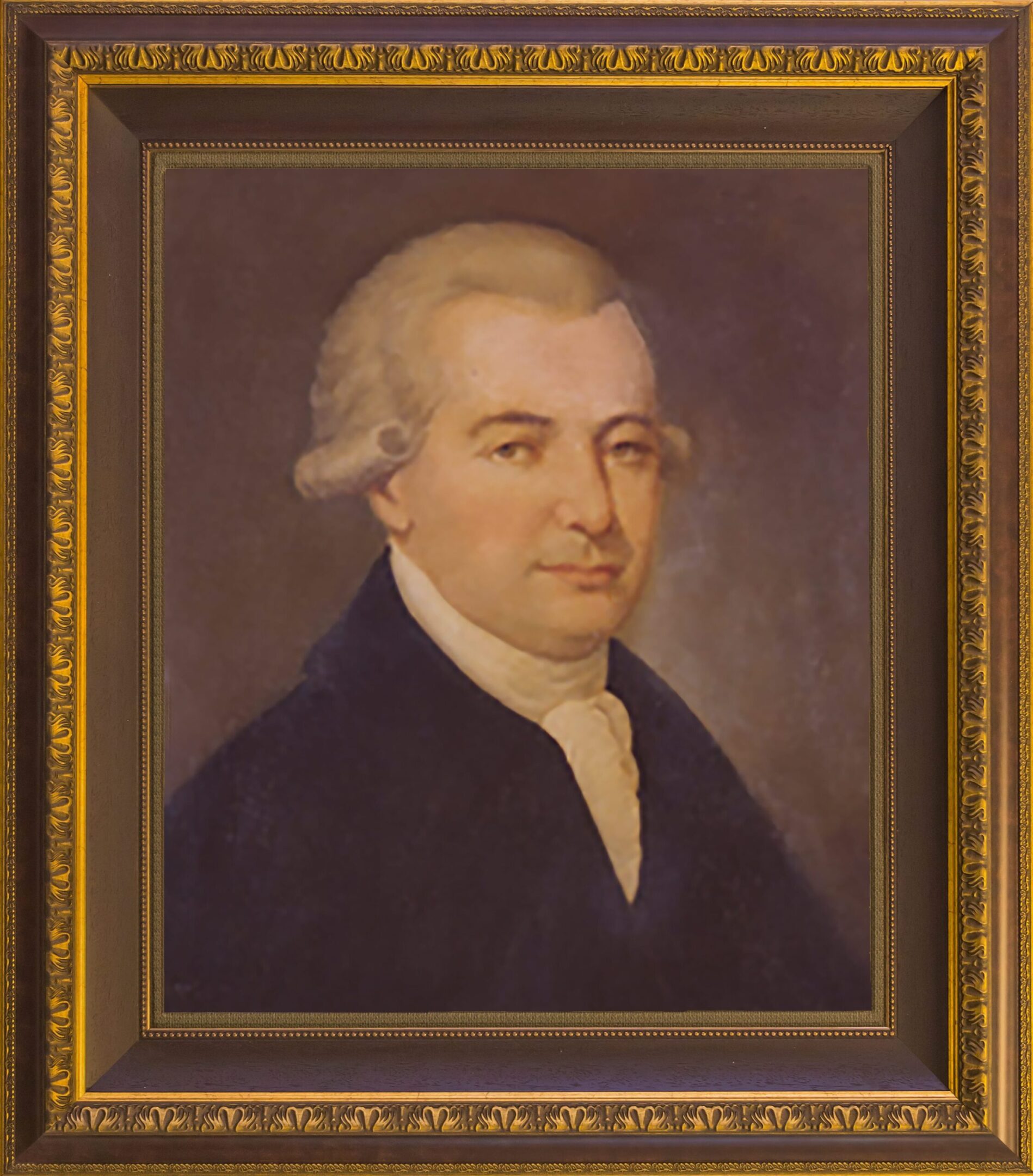 Portrait of a man in formal attire.