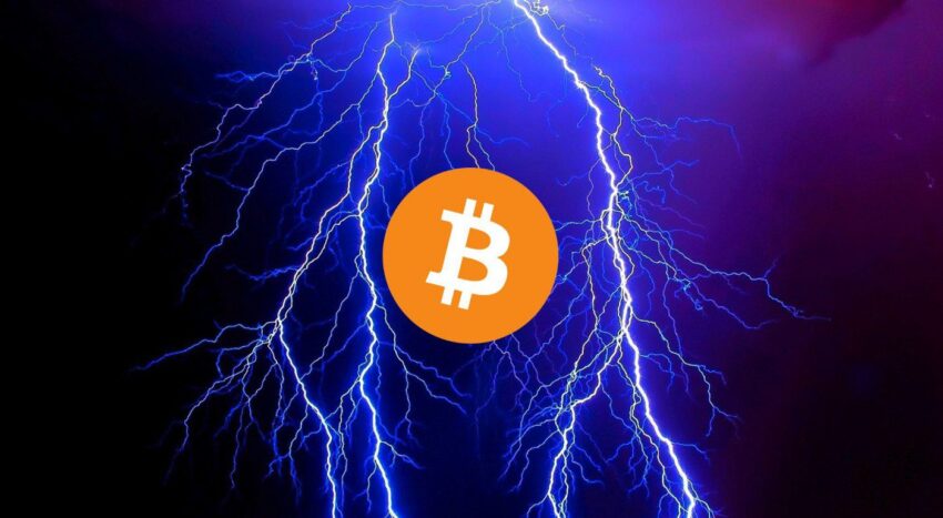 Bitcoin symbol glowing in front of blue lightning bolts on a dark background.